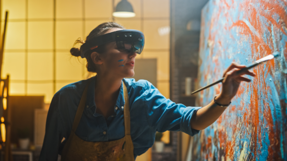 Woman painting on a canvas