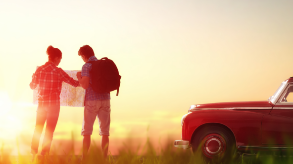 Travellers looking on a map